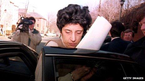 Maria del Rosario Casas Ames next to a car