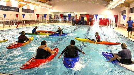 Kayakers on the pool in Harlech