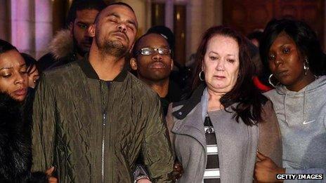 Relatives of Mark Duggan outside the Royal Courts of Justice