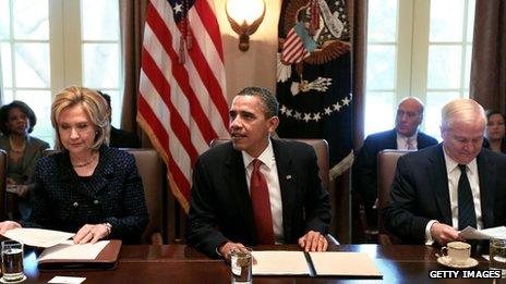 Clinton and Gates, shown with the president