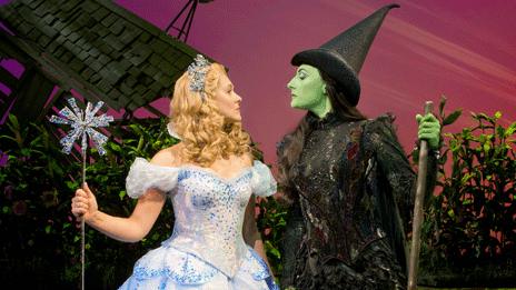 Savannah Stevenson as Glenda the good witch and Willemijn Verkaik as Elphaba