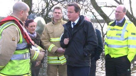 David Cameron with emergency services