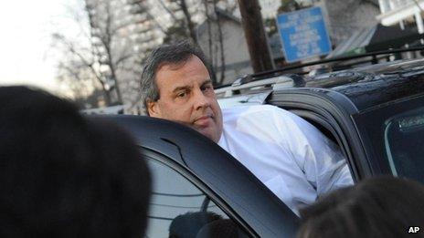 New Jersey Governor Chris Christie leaves after a visit to Fort Lee City Hall 9 January 2014