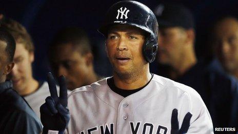 Alex Rodriguez celebrates his home run against the Toronto Blue Jays during the fifth inning of their MLB American League baseball game in Toronto on 26 August 2013.