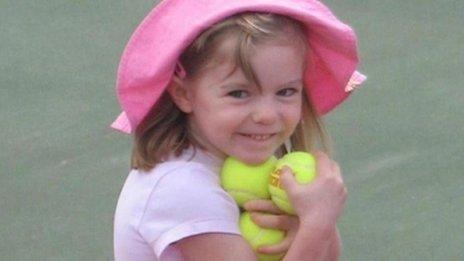 Madeleine McCann, holding several tennis balls, shortly before her disappearance