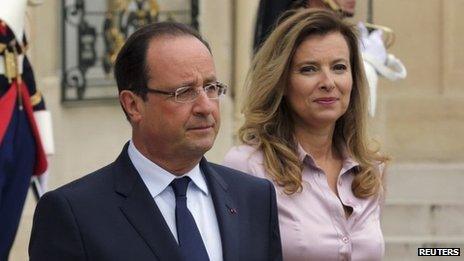 French President Francois Hollande (centre) with Valerie Trierweiler at the Elysee palace, 1 October 2013