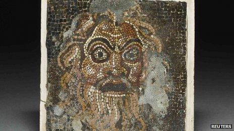 A comic mask mosaic, one of the exhibits in "Life and death in Pompeii and Herculaneum