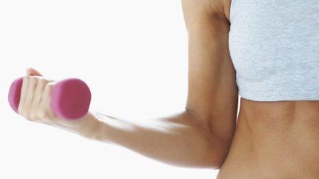 lady using weights