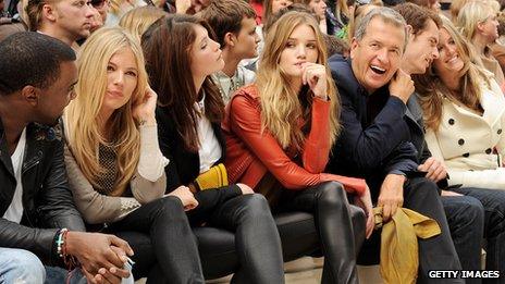 Mario Testino in the front row at Burberry fashion show