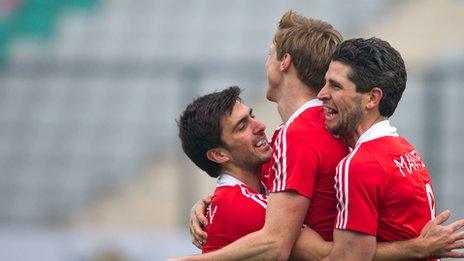 Tom Carson celebrates scoring for England