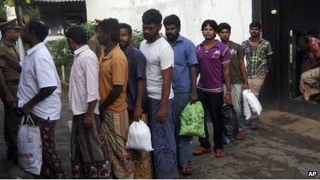 A group of Indian fishermen line up after their release from a jail in Sri Lanka 13 Jan 2014