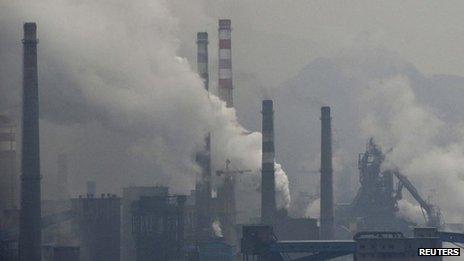 Smoke rises from chimneys and facilities of steel plants in Benxi, China. Photo: November 2013