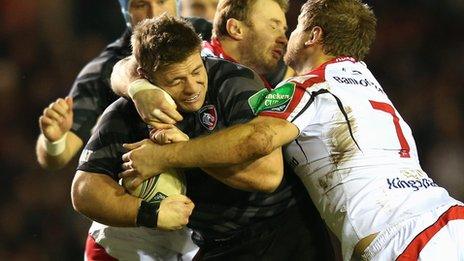 Leicester hooker Tom Young is tackled