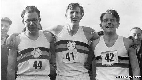 Roger Bannister (centre) with Chris Chataway (right) and Chris Brasher (1928 - 2003) after Bannister broke the mile world record with a time of 3 minutes and 59.4 seconds.