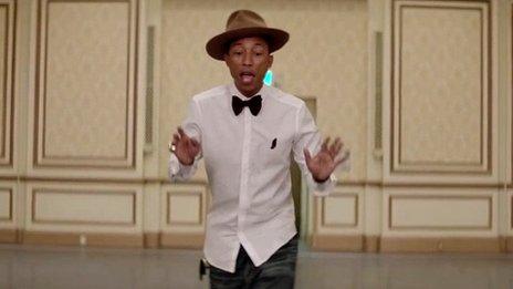 Pharrell Williams in the video for Happy