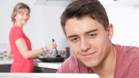 Mother and son in kitchen