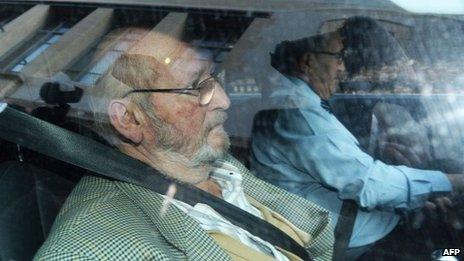 Jean-Claude Mas (left) arrives at the court in Marseille, 10 December