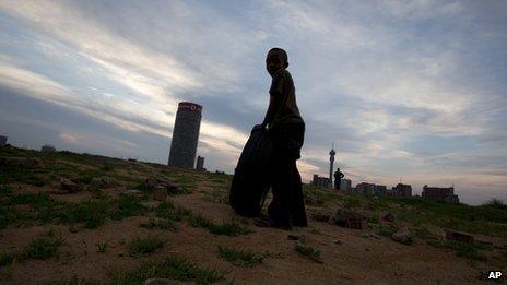 Boy in wasteland, South Africa