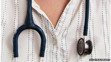 Stethoscope round a doctor's neck