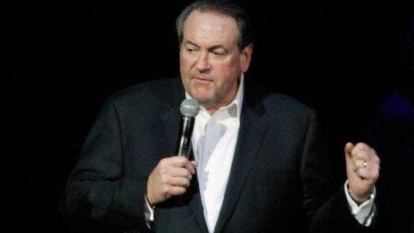 Mike Huckabee speaks on stage in Nashville on November 22, 2013.