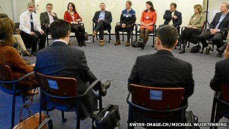 Delegates at a mindfulness meeting at the World Economic Forum