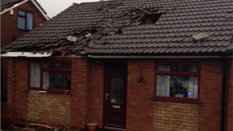 Police said five properties in Hickman Road were badly damaged and a number of others had roof tiles blown off.