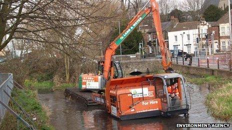 Dredging - shown here in east London - would not stop floods in Somerset, says the Environment Agency