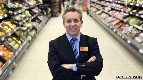 Justin King in a Sainsbury's supermarket aisle