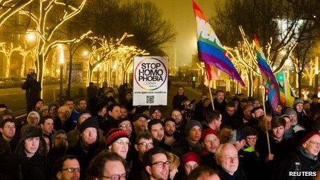 Protesters in Berlin on 12 December 2013 call on Russia to lift laws banning promotion of homosexuality