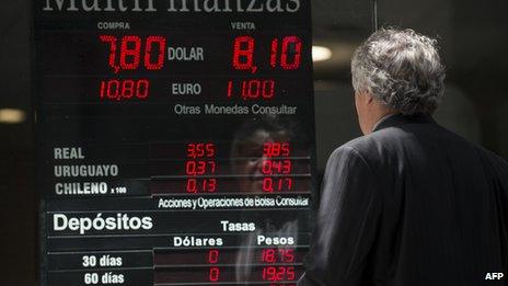 A man at a currency board