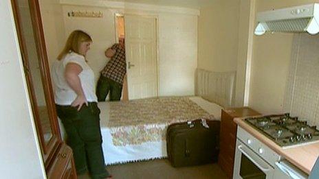 Inspectors looking at a converted outbuilding