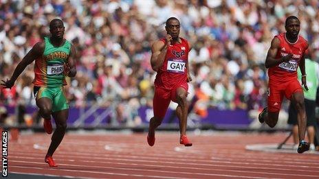 Gerald Phiri of Zambia, Tyson Gay of the United States and Richard Thompson of Trinidad and Tobago compete in the Men's 100m Round 1 Heats on Day 8 of the London 2012 Olympic Games.