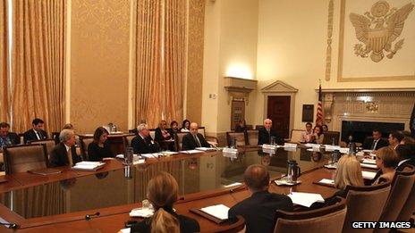 Ben Bernanke sitting at FOMC table in Fed