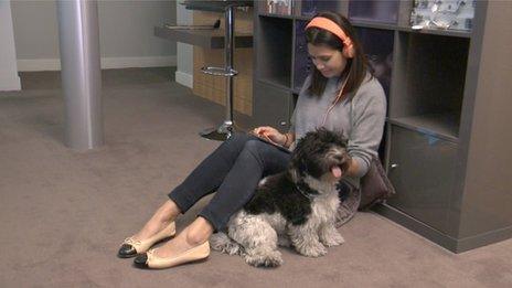 Woman listening to radio on tablet
