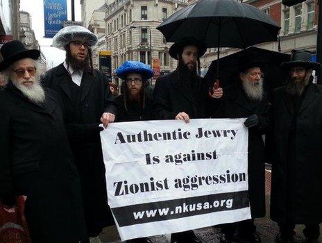 Members of the anti-Zionist Neturei Karta sect protesting