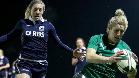 Winger Alison Miller scores a try for Ireland against Scotland