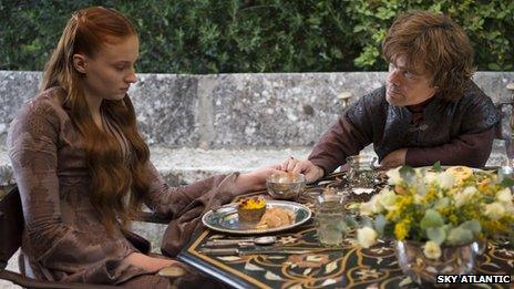 Sophie Turner and Peter Dinklage as Sansa Stark and Tyrion Lannister