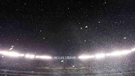 Confetti floats in the air during post game celebrations as the Seattle Seahawks defeated the Denver Broncos in the NFL Super Bowl XLVIII football game in East Rutherford, New Jersey, on 2 February 2014.