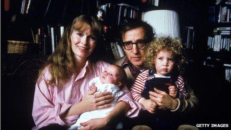 Mia Farrow, Woody Allen, Satchel and Dylan in a portrait taken in 1988