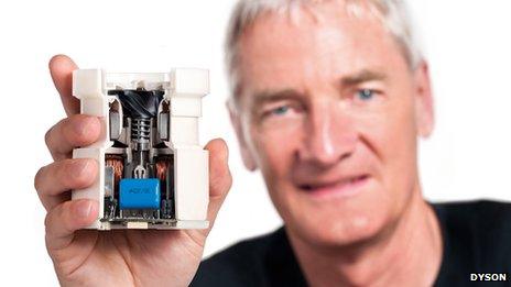 Sir James Dyson holding an impeller unit