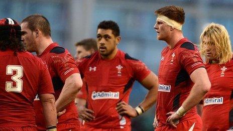 Dejected Wales players