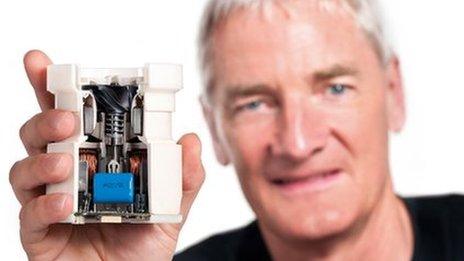 Sir James Dyson holding an impeller unit