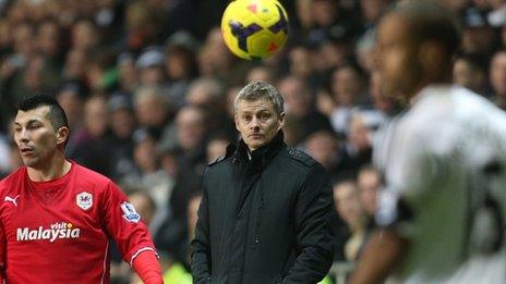 Cardiff's Gary Medel and Ole Gunnar Solskjaer