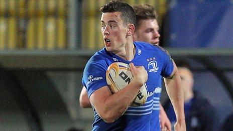 Noel Reid runs through to score a try for Leinster