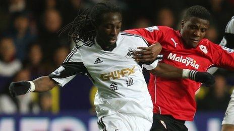 Swansea City's Marvin Emnes and Cardiff City's Wilfried Zaha
