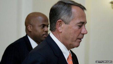 Speaker John Boehner leaves a press conference after the House of Representatives voted to increase the US borrowing authority on 11 February, 2014