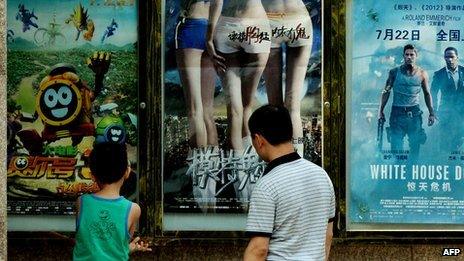 Looking at film posters in Beijing