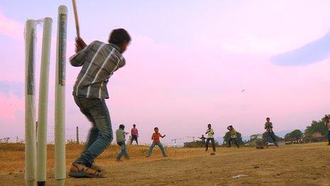 Kids playing cricket in India