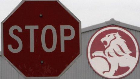 A stop sign is seen near a General Motors Holden storage facility in Melbourne