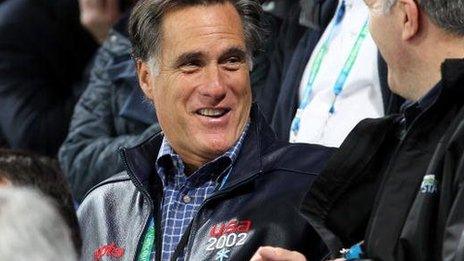 Mitt Romney sits in the stands during the 2010 Winter Games in Vancouver, Canada.